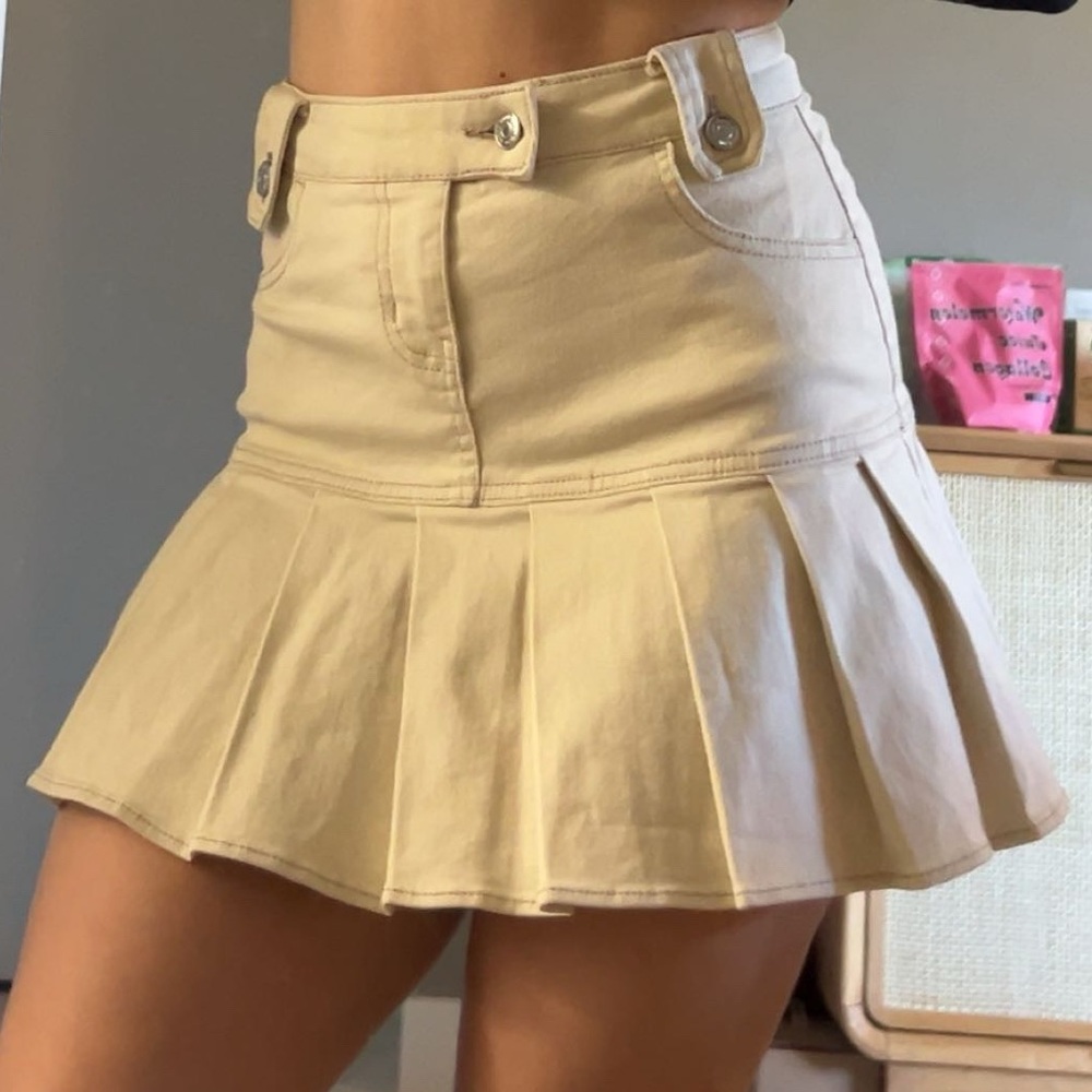 cream pleated mini skirt